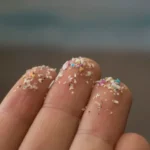 Microplastics on fingertips